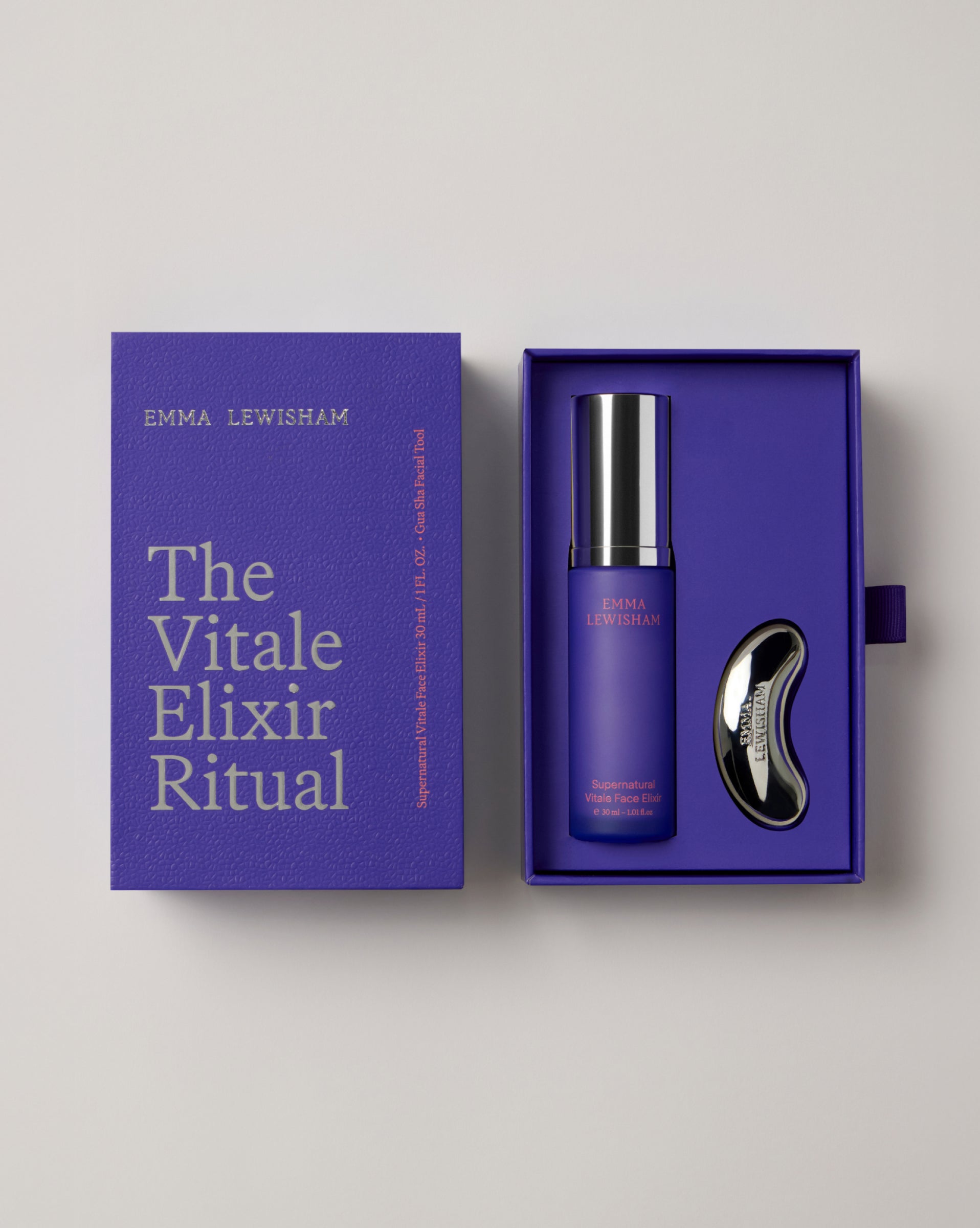 
          Emma Lewisham 'The Vitale Elixir Ritual' set with a purple box and bottle on a light gray background
        